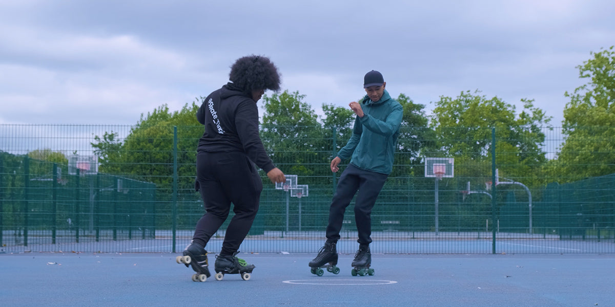 Mellow and Amir jam skating in Finsbury Park during a video shoot for a roller skate tutorial video.