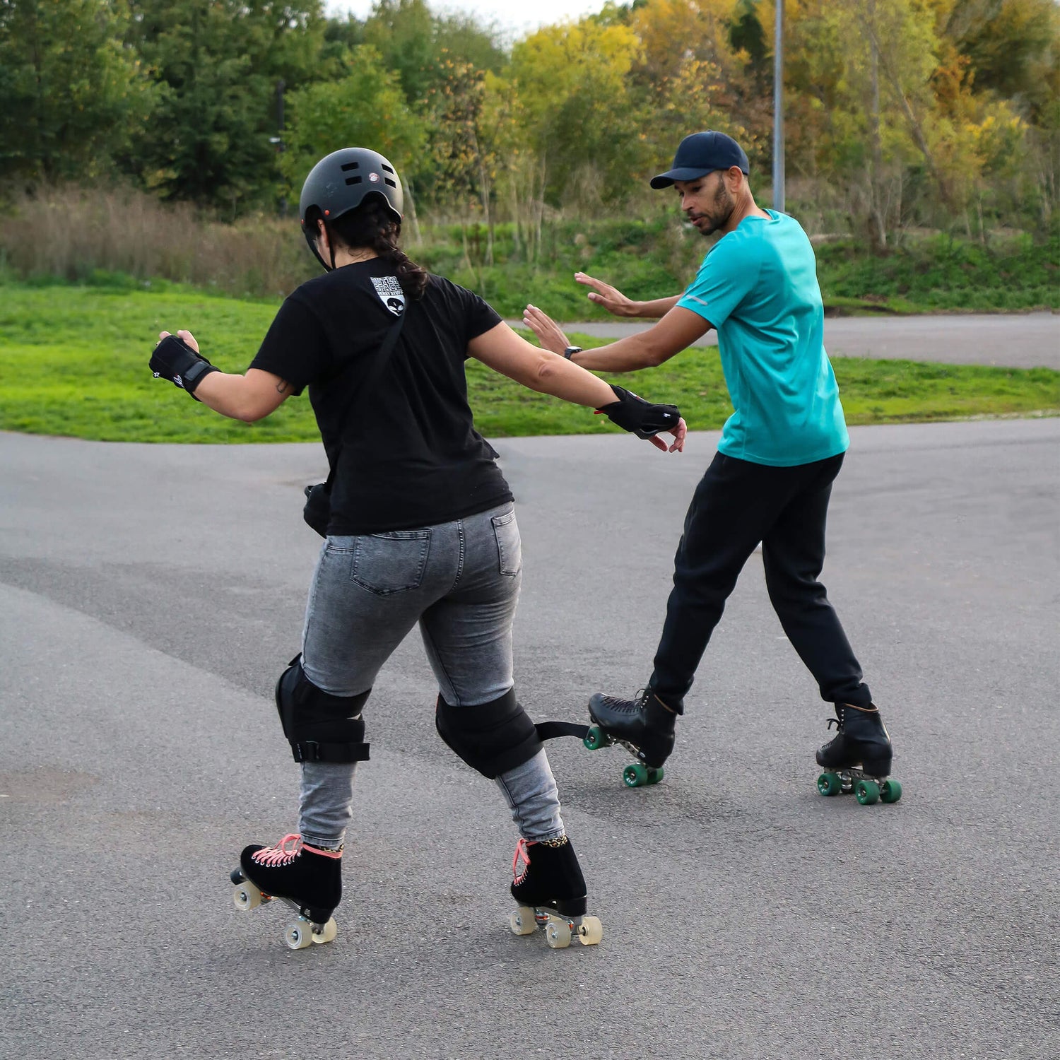 New roller skater learning how to turn during a skate lesson Burgess Park